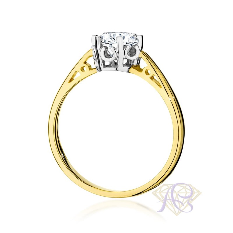 Pierścionek złoty z brylantem 0.70ct W-542